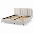 Lit double Yavrixo 160x200 cm en tissu beige avec sommier à lattes, style contemporain visible sur l'image.